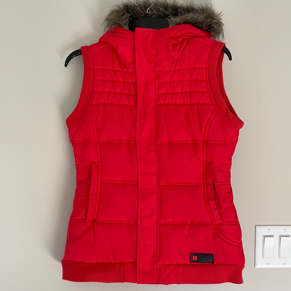 Burton Women’s Vest size small in a bright orange/red. In like new condition.
